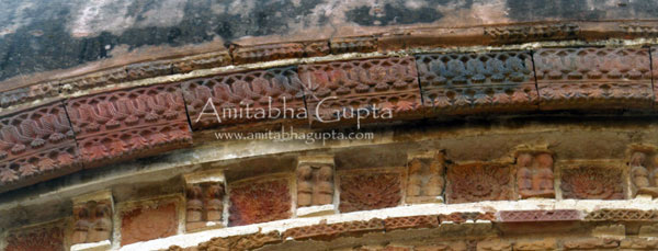 Floral decoration near the top of the Aatchala temple located to the right of the viewer, Nanoor