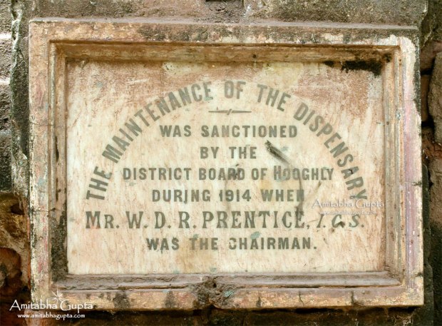 Old signage claiming that maintenance of dispensary was sanctioned by district board of Hooghly